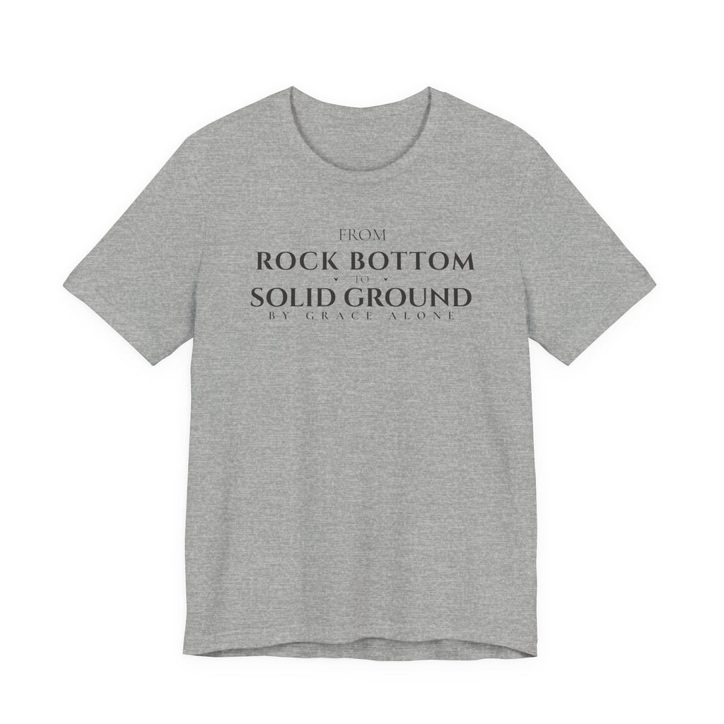From Rock Bottom to Solid Ground Tee – By Grace Alone Christian Shirt