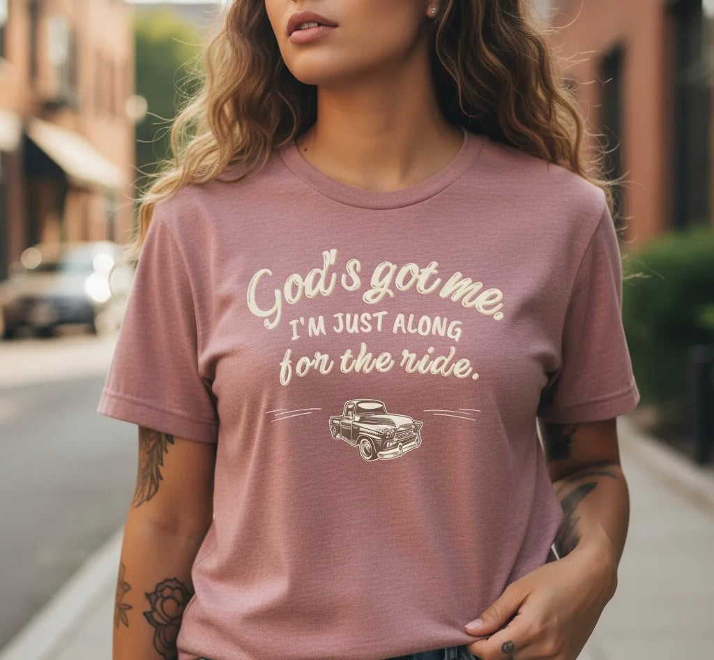 God’s Got Me, I’m Just Along for the Ride Tee
