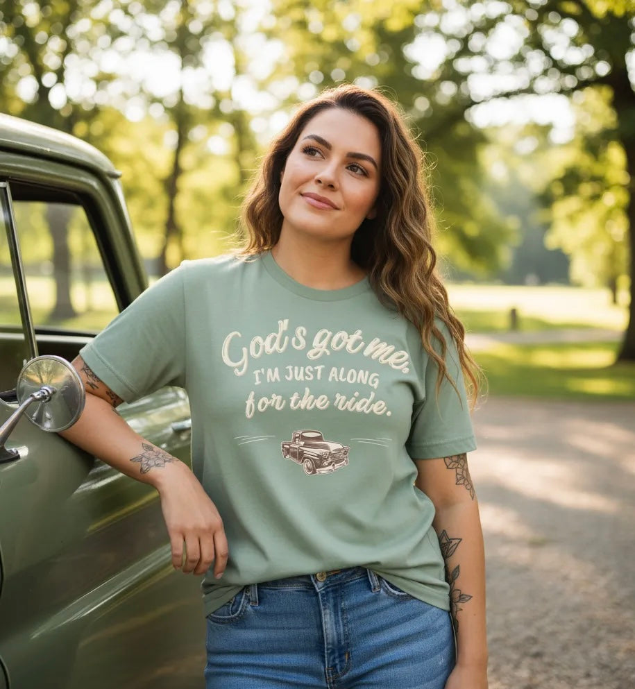 God’s Got Me, I’m Just Along for the Ride Tee