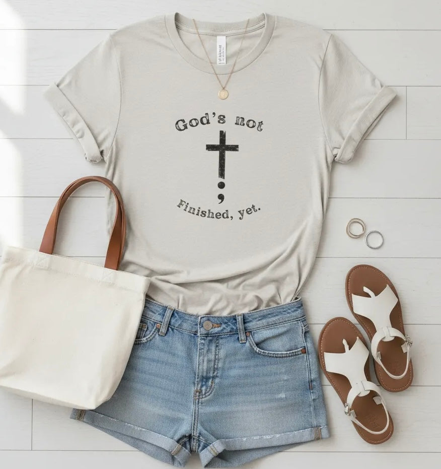 God's Not Finished Yet T-Shirt — Inspirational Christian Faith Tee with Cross