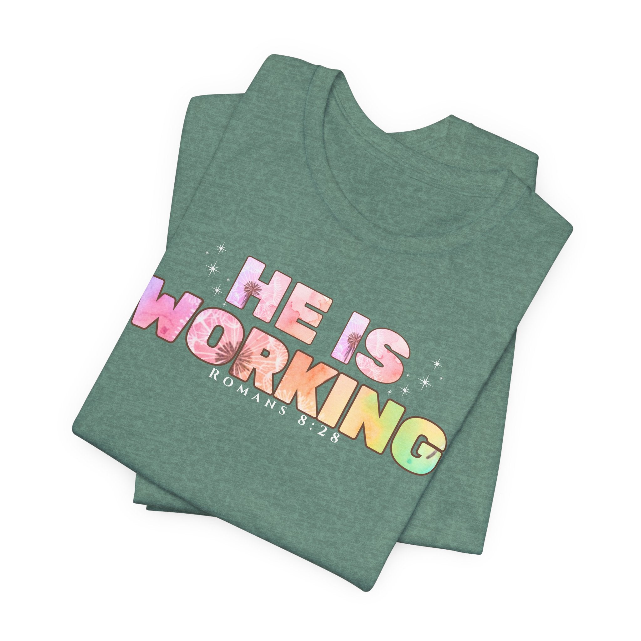 He Is Working – Romans 8:28 Christian Tee