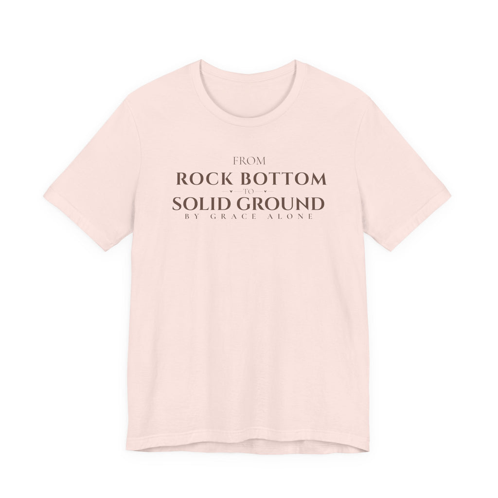 From Rock Bottom to Solid Ground Tee – By Grace Alone Christian Shirt