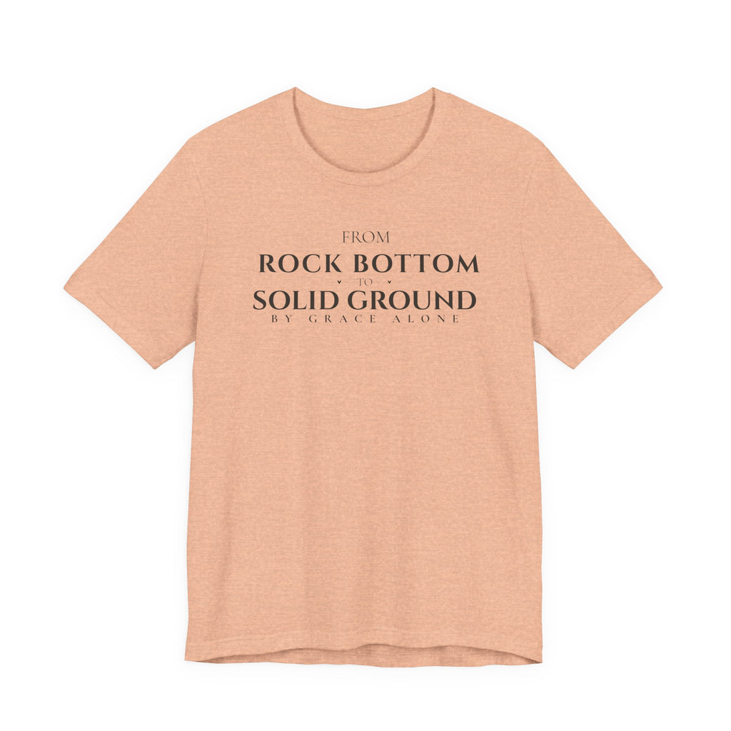 From Rock Bottom to Solid Ground Tee – By Grace Alone Christian Shirt